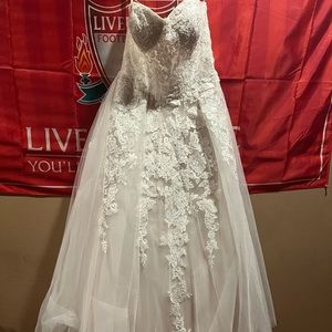 Size 10 David’s Bridal, strapless, lace wedding gown.